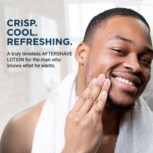 Smooth application of Blue Spice aftershave lotion for soothing skin.