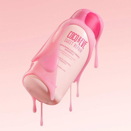 Pouring Coco & Eve Repairing Shampoo signals easy, luxurious hair care.