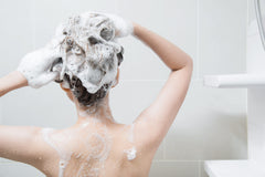 Cocojojo shampoo foam demonstrates gentle cleansing in action.