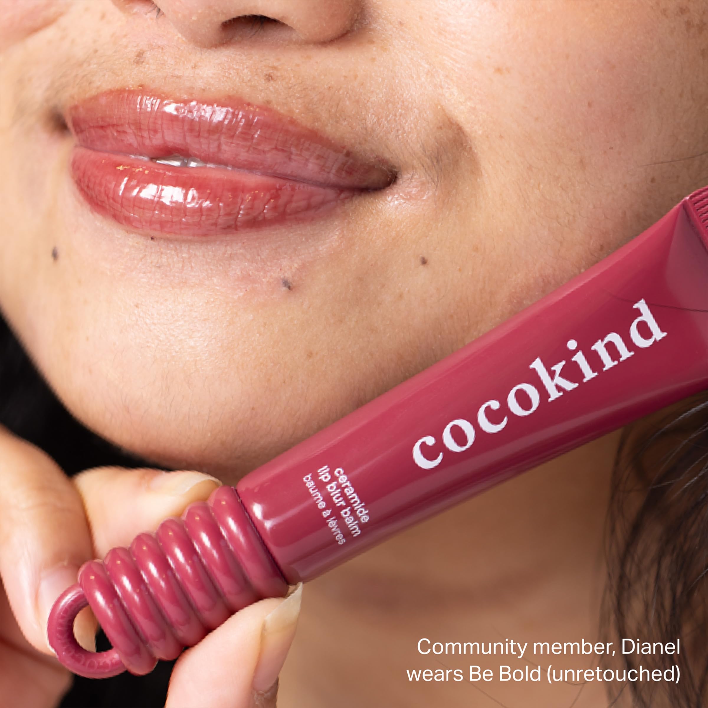 Cocokind Lip Blur Burgundy on a bag for convenient, mess-free lip care.