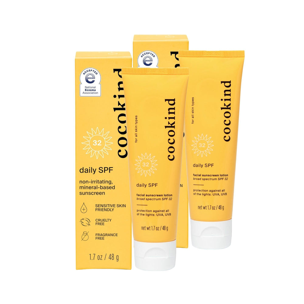 Cocokind Daily SPF bottle pour showing mineral sunscreen for daily protection and fragrance-free care.