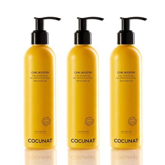COCUNAT 3 Curl Booster bottle shows frizz control and deep hydration for defined curls.