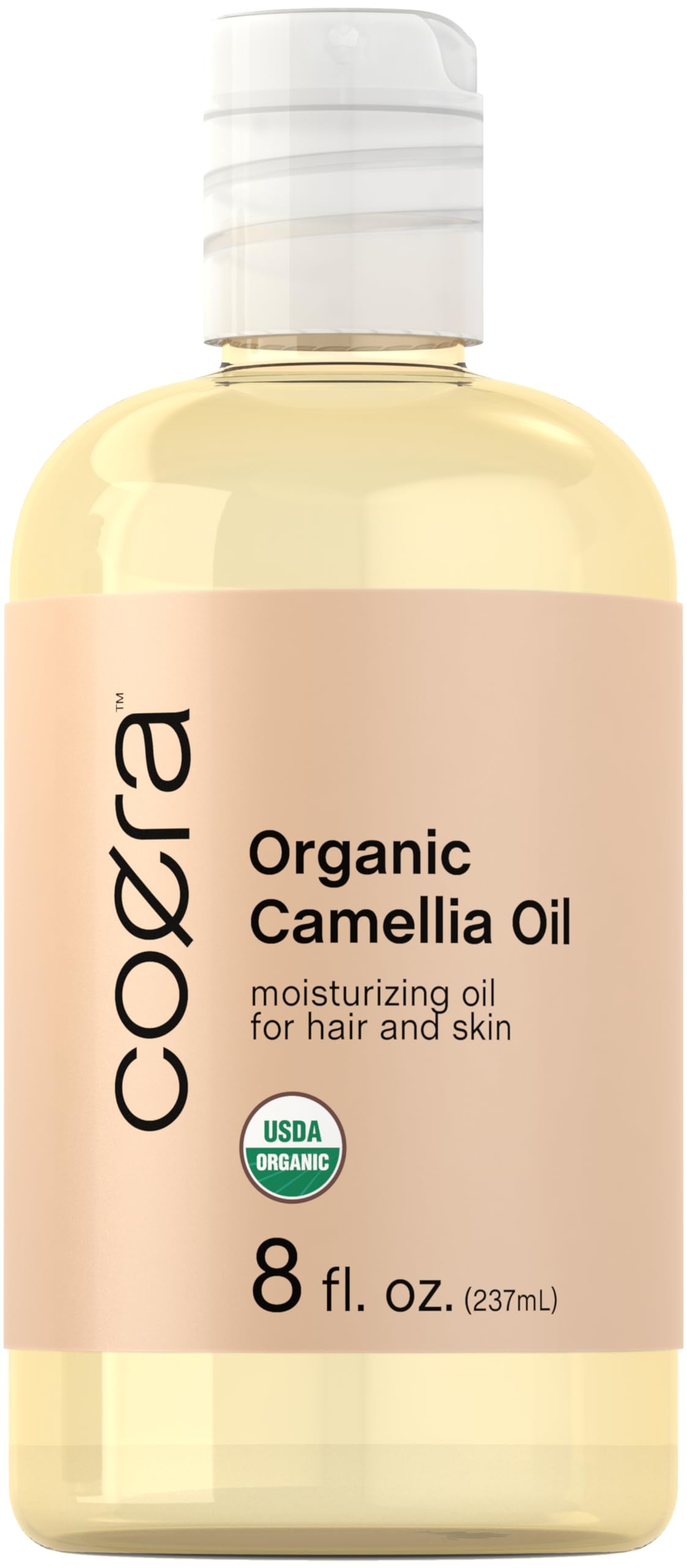 Coera Camellia Oil bottle highlighting organic formula for hair and skin.