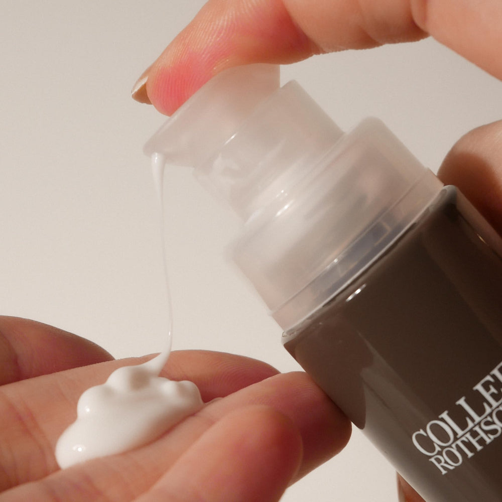 COLLEEN ROTHSCHILD serum dropper close-up showing precise application.