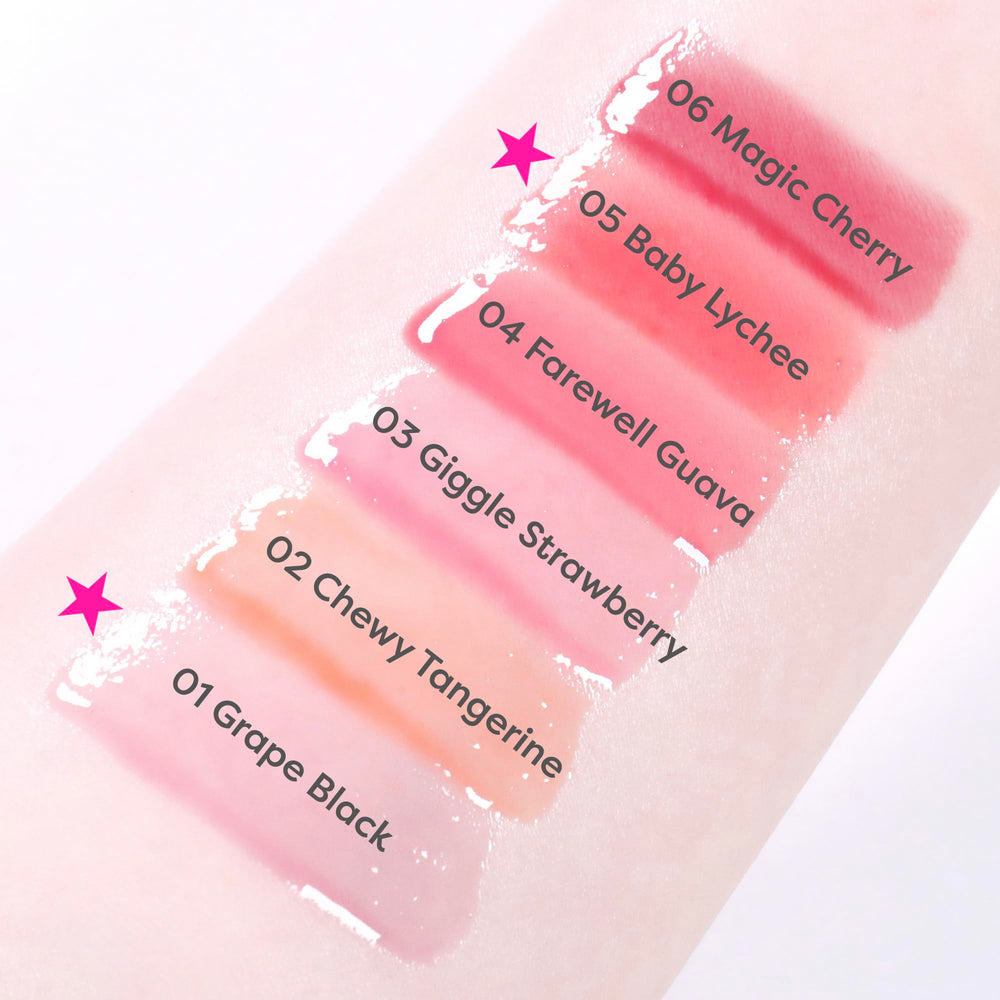 COLORGRAM Fruity Glass Gloss on lips delivers a hydrated, plump-looking glow.