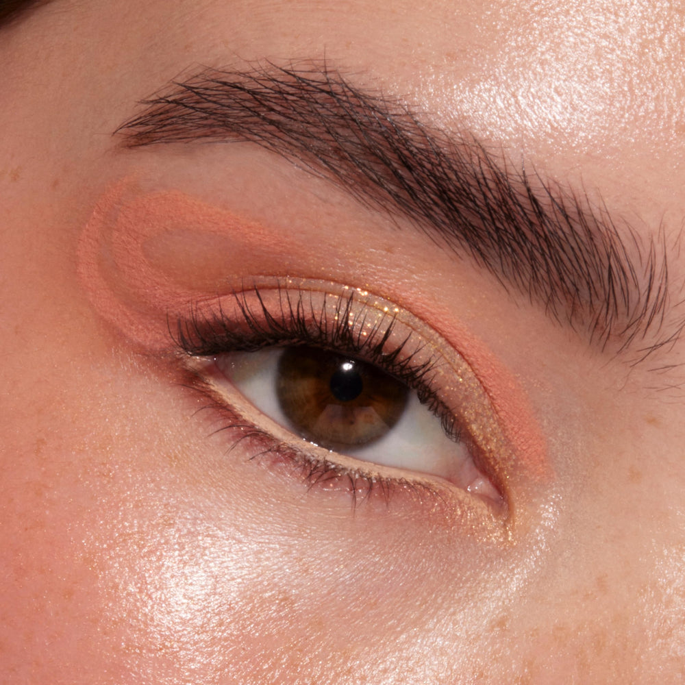ColourPop Baby Got Peach glitter gold shade adds festive sparkle to any look.