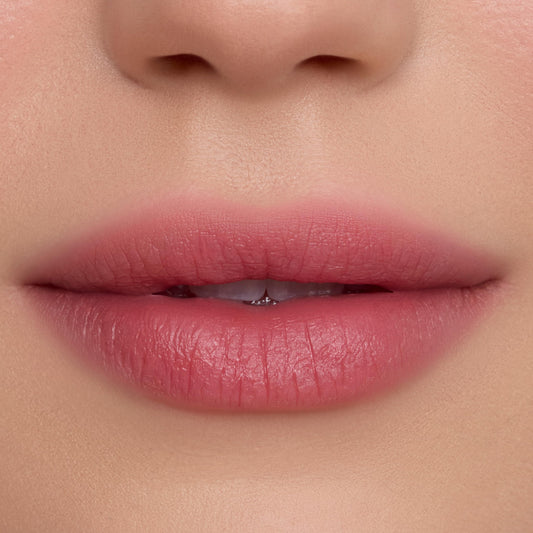Texture closeup of ColourPop Cloud Whip reveals whipped, light lip feel.