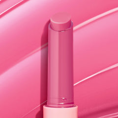 ColourPop Dolled Up gloss tube close-up highlights hydrating, glossy shine.