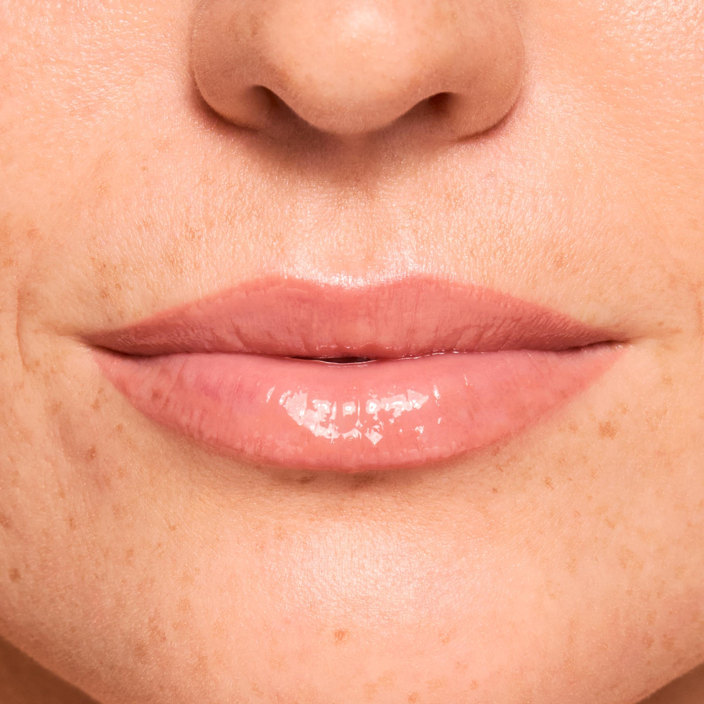 ColourPop Fresh Kiss formula close-up highlighting peptides and hyaluronic acid ingredients.