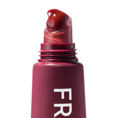 ColourPop Fresh Kiss application closeup demonstrates easy swipe-on moisture and glossy finish