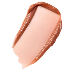 ColourPop Fresh Kiss lip balm texture close-up showing creamy hydration and glossy finish.