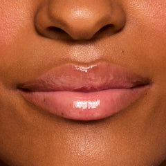 ColourPop Fresh Kiss applied over lipstick for enhanced lip glow