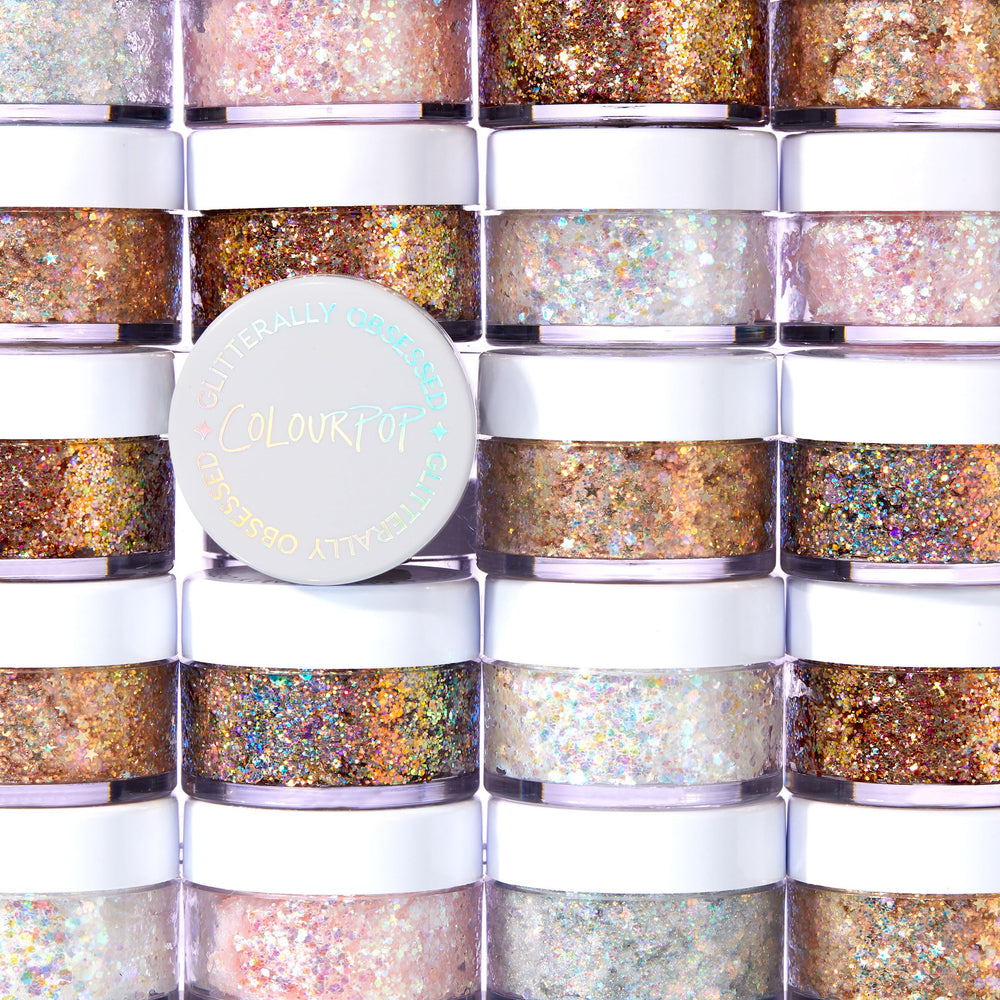 ColourPop Glitterally Obsessed Body Glitter Gel on cheeks creates reflective highlight.