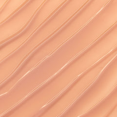 ColourPop Lux Lip Oil nude shade close-up with soft-warm tone