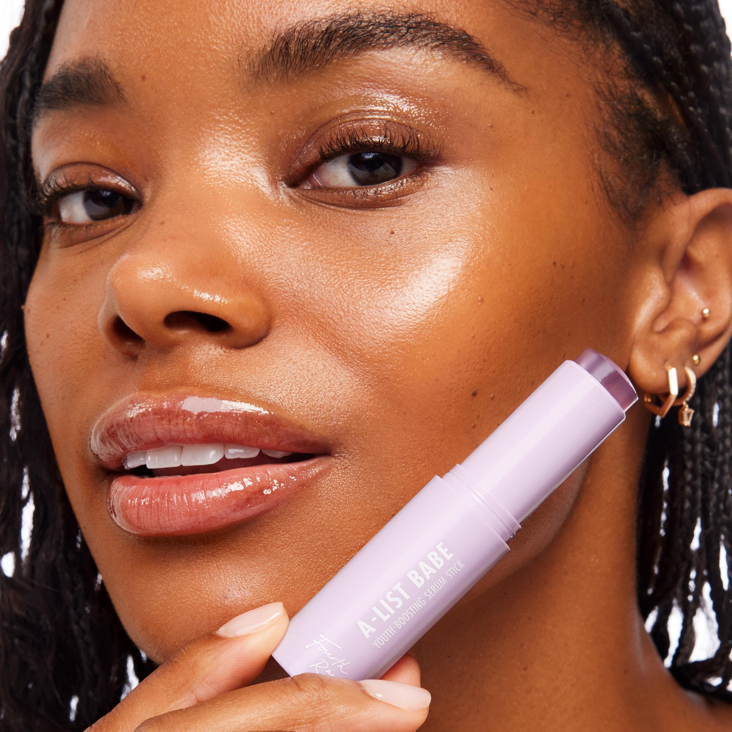 ColourPop Retinol Serum Stick used as a primer-like glow boost before makeup.