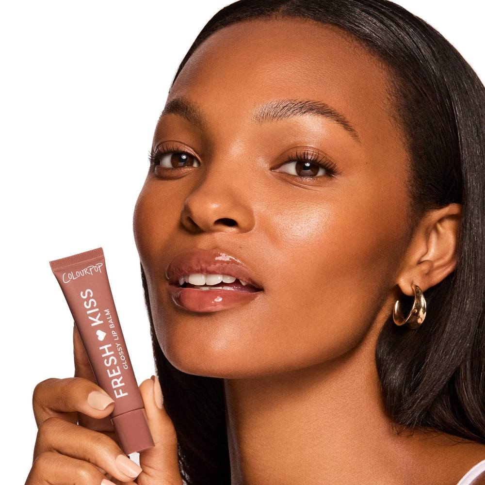 ColourPop shea butter and vitamin E balm shot focusing on nourishment and softness.