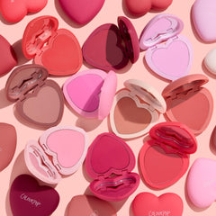 ColourPop Silky Powder Blush shades array in heart-shaped compact on vanity