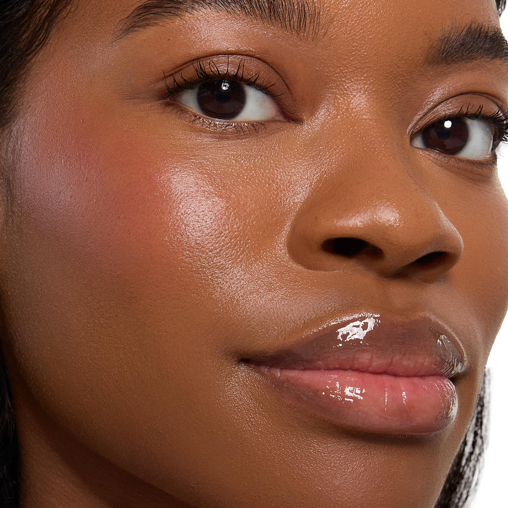 Blush applied with dense brush for buildable color payoff.