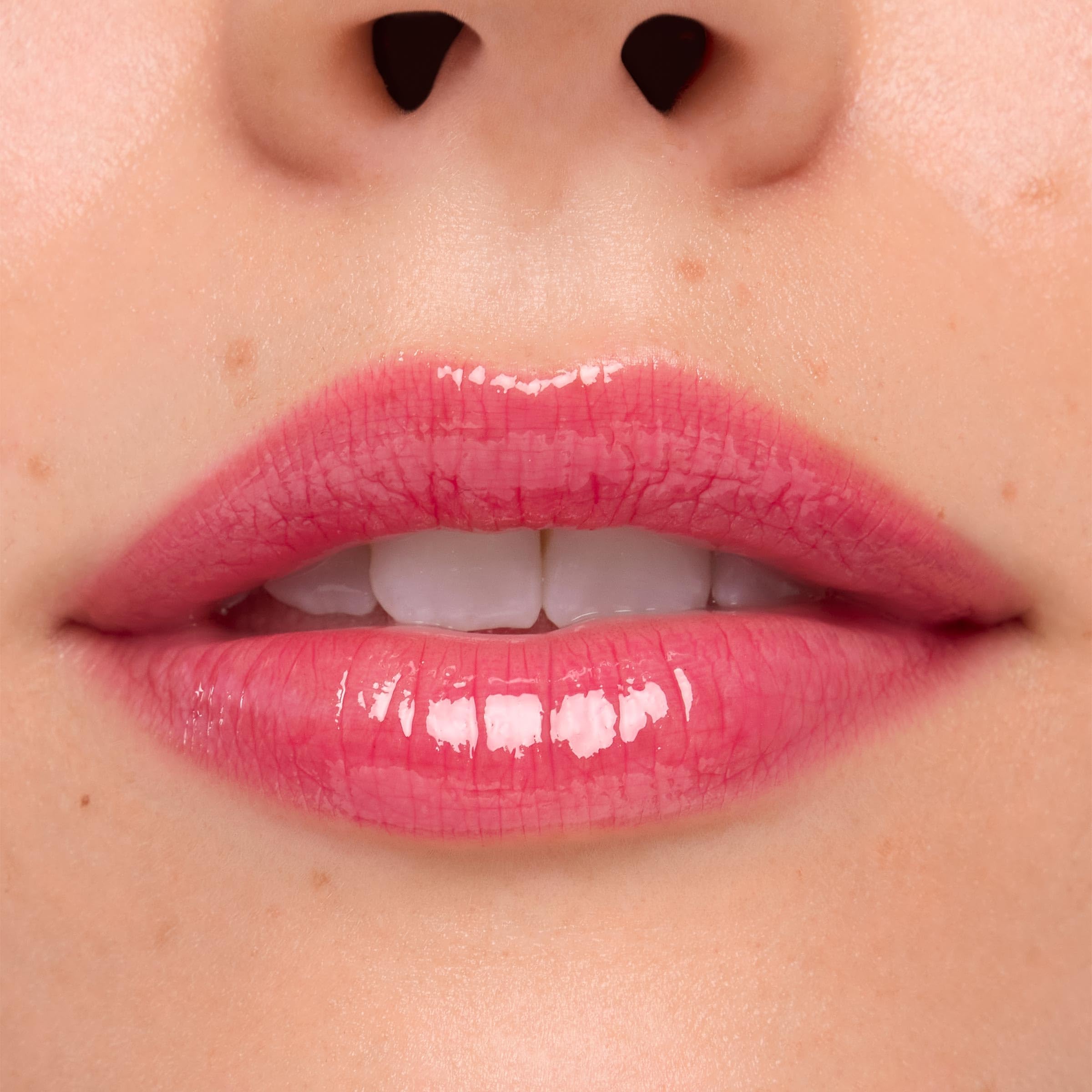 ColourPop Stitch lip gloss in sheer hot pink for everyday glamour.
