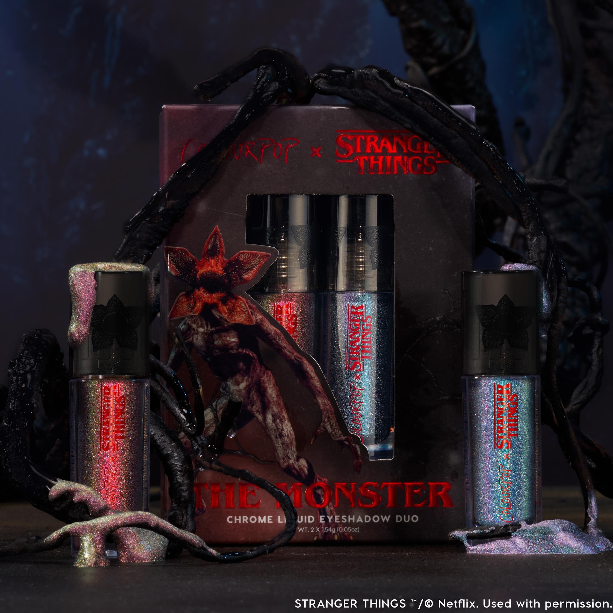 ColourPop Stranger Things Chrome Liquid Eyeshadow two-shades close-up shows reflective pearls.