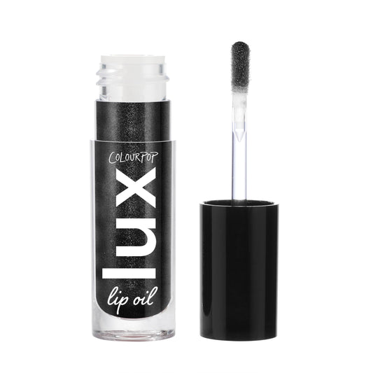 ColourPop Twilight Lux Lip Oil bottle cap close-up showing hydration.