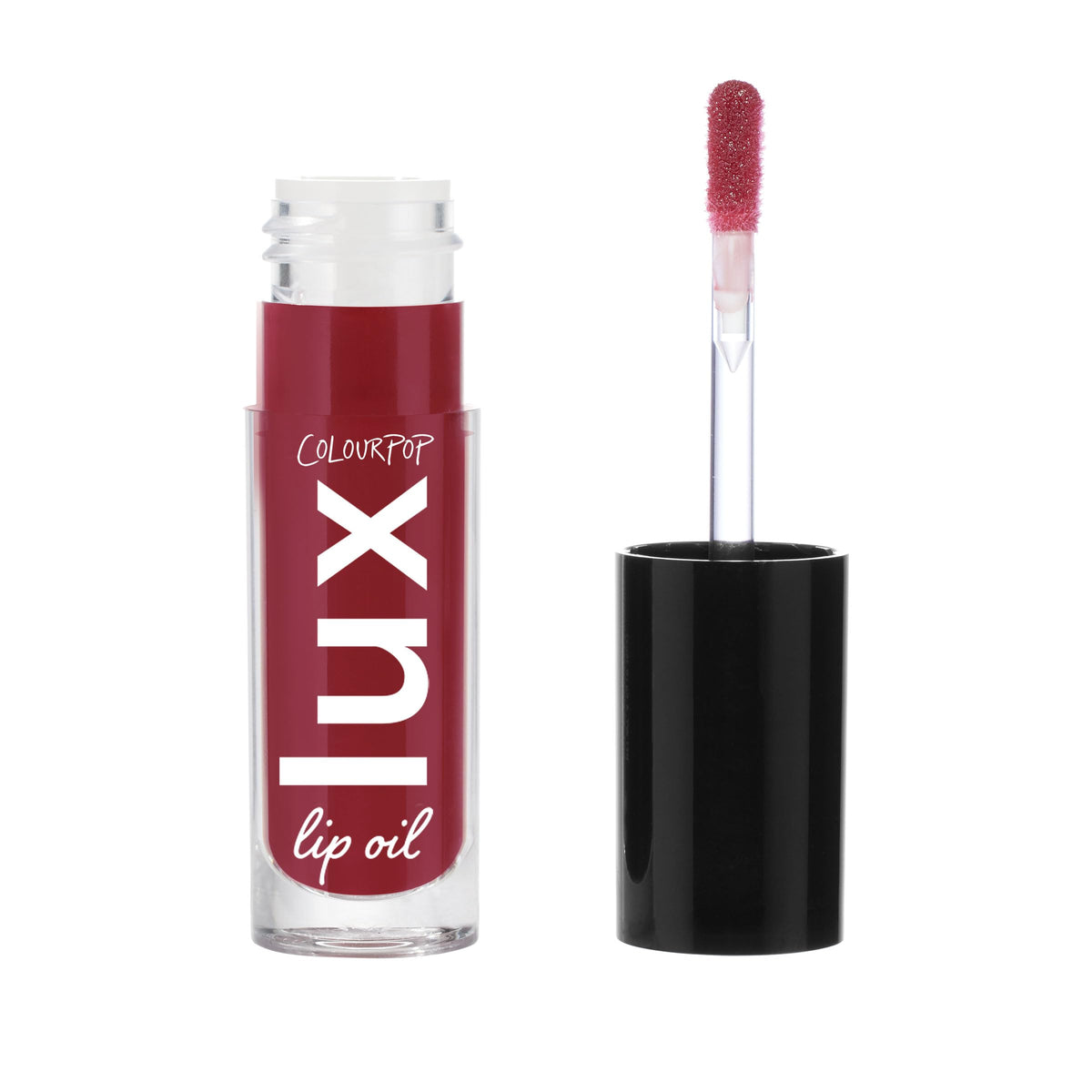 ColourPop Twilight Lux Lip Oil swatch displaying sheer color and hydrating shine.