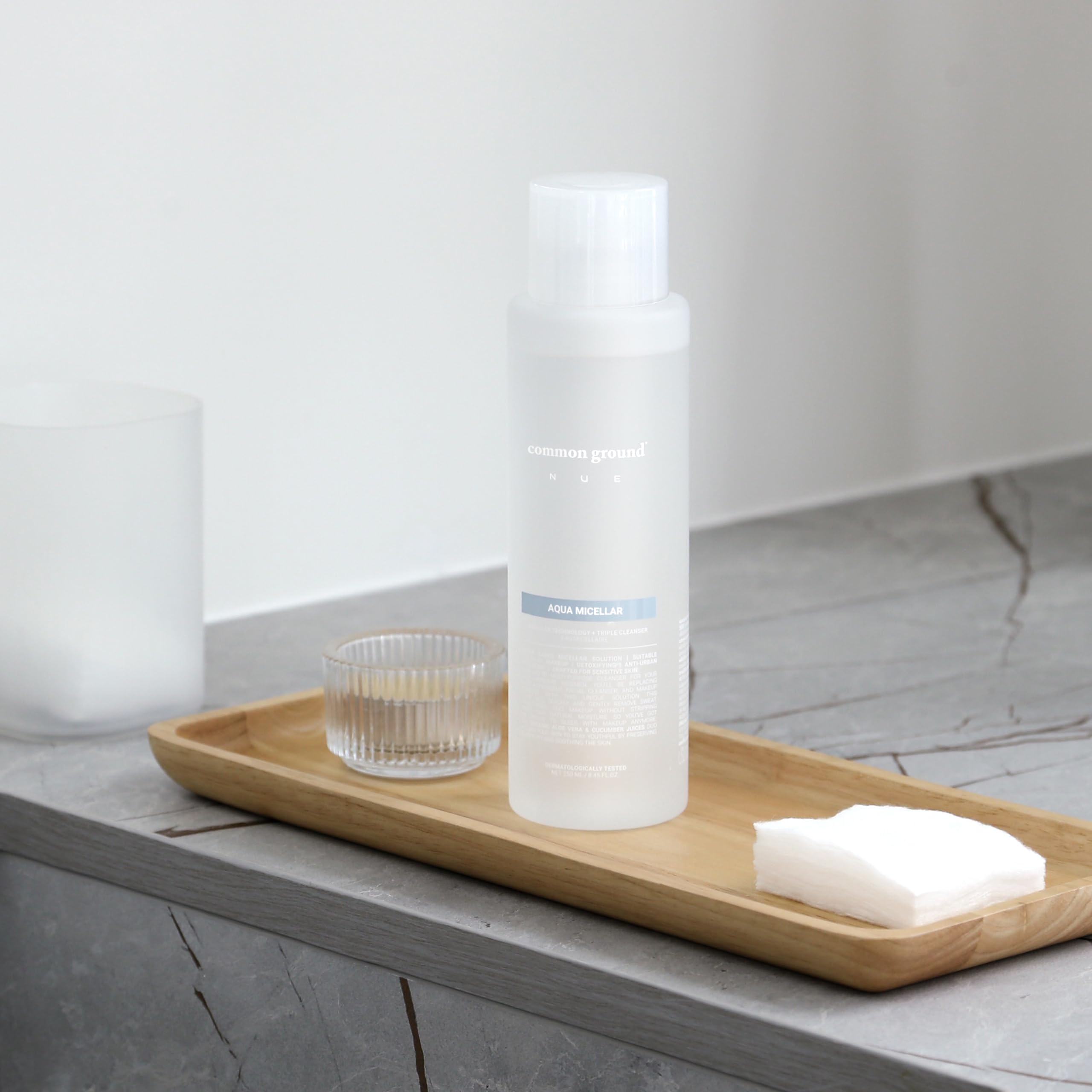 Common Ground NUE Aqua Micellar vegan certification seal appears beside the bottle.