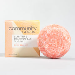 Community Goods Citrus Squeeze Shampoo Bar packaging showcases recyclable materials for eco-conscious shoppers.