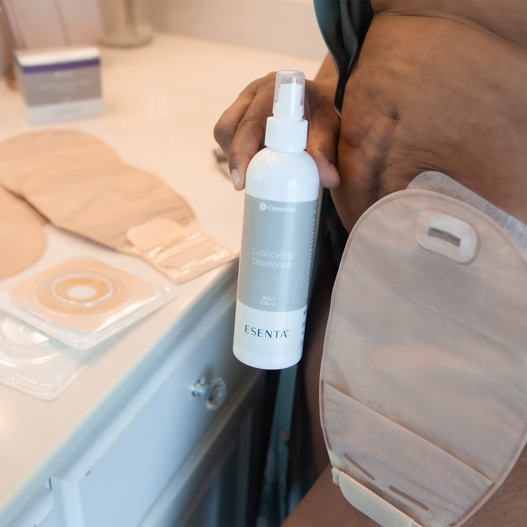 Water-based Esenta formula shown with clear, colorless spray.