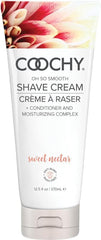 Coochy Shave Cream bottle showing a gentle, hydrating shaving formula.