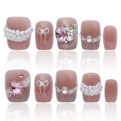 COOLYOUNG Pink short square ballet nails closeup showing vibrant color and precise edges