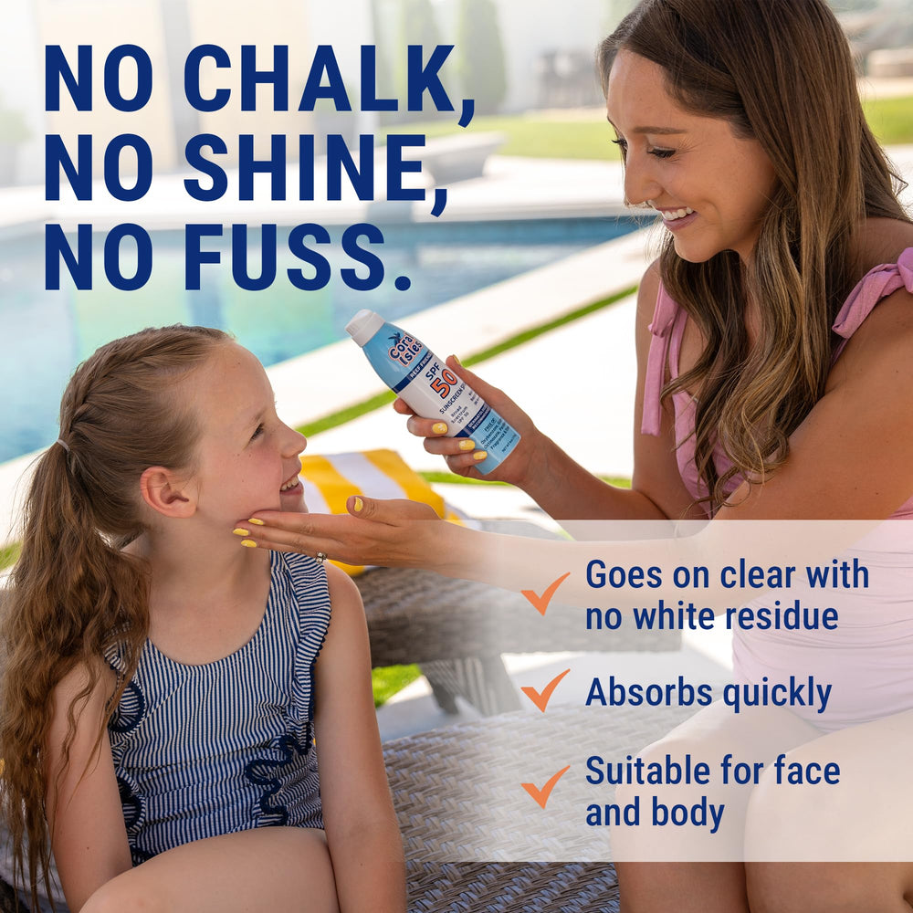 Hands applying Coral Isles Sunscreen spray for outdoor activity