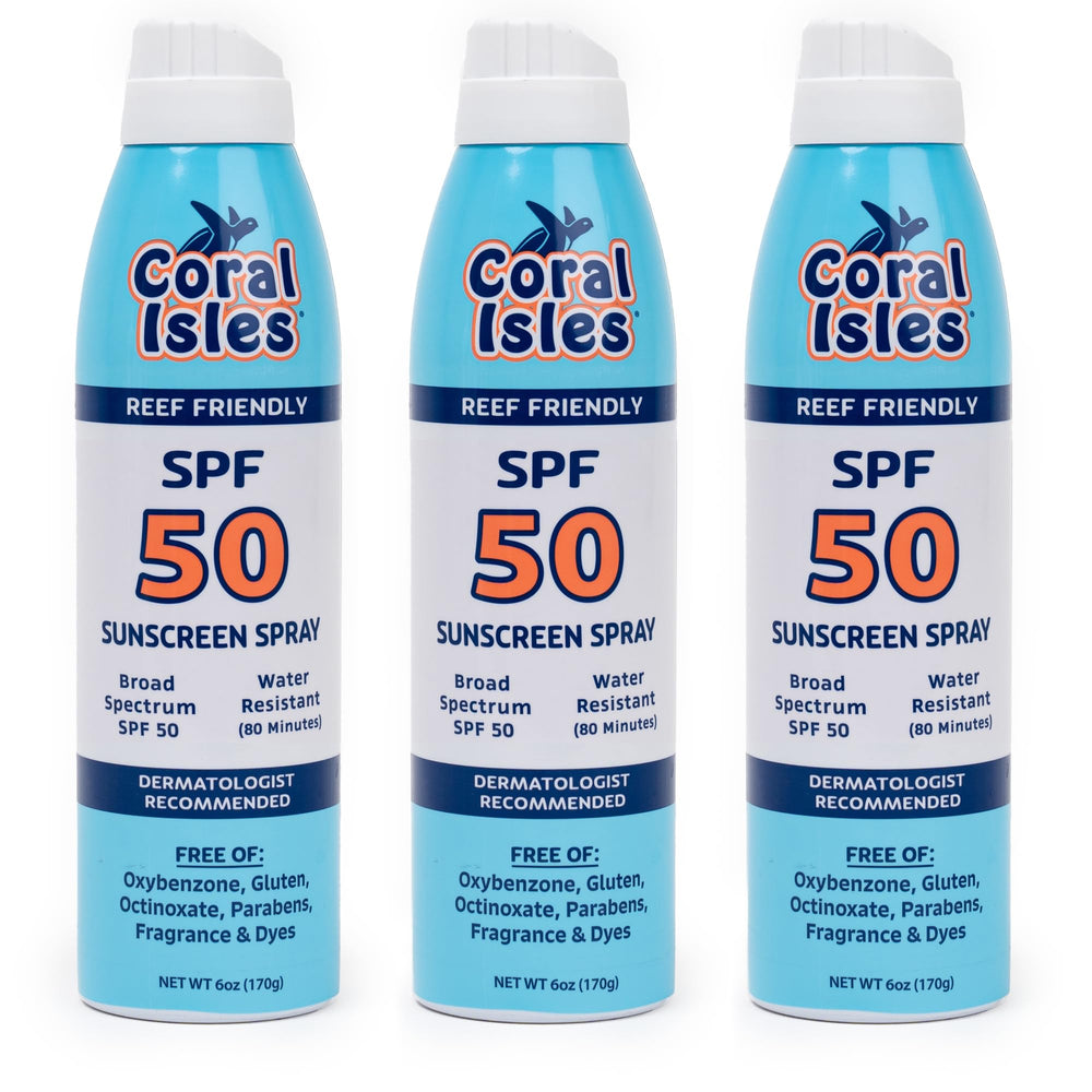 Coral Isles Sunscreen three-pack on beach ready for use