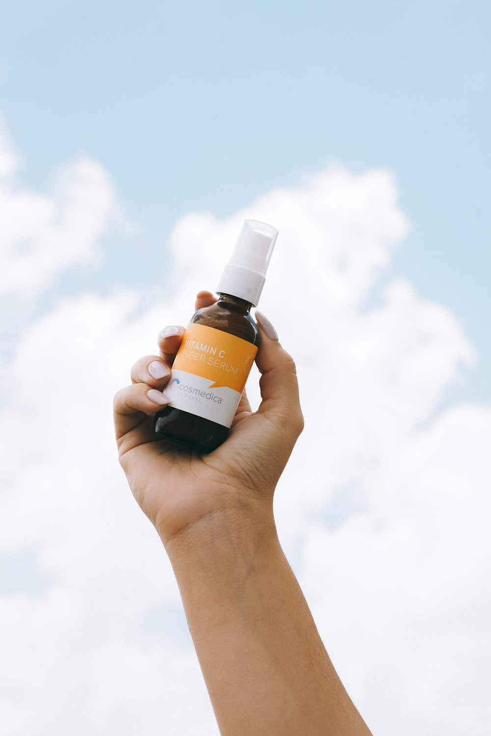 CosMedica Vitamin C Super Serum texture shown on skin for a smooth, non greasy finish.