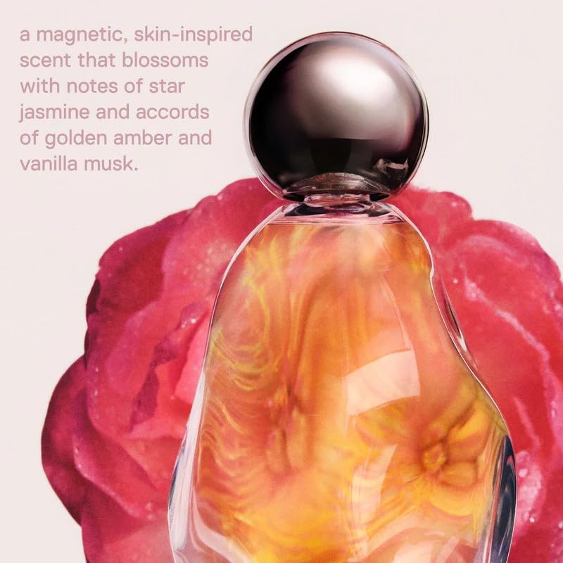 Cosmic by Kylie Jenner pen spray applied on the wrist for on-the-go scent.