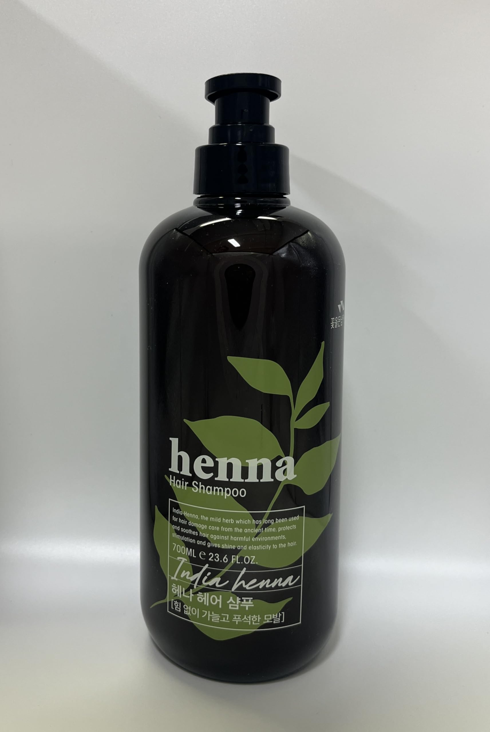 COSMOCOS Henna Hair Shampoo creating a rich foamy lather during washing.