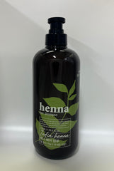 COSMOCOS Henna Hair Shampoo creating a rich foamy lather during washing.