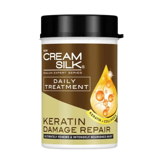 Cream Silk Daily Treatment keratin damage repair bottle pour for nourished, smoother hair.