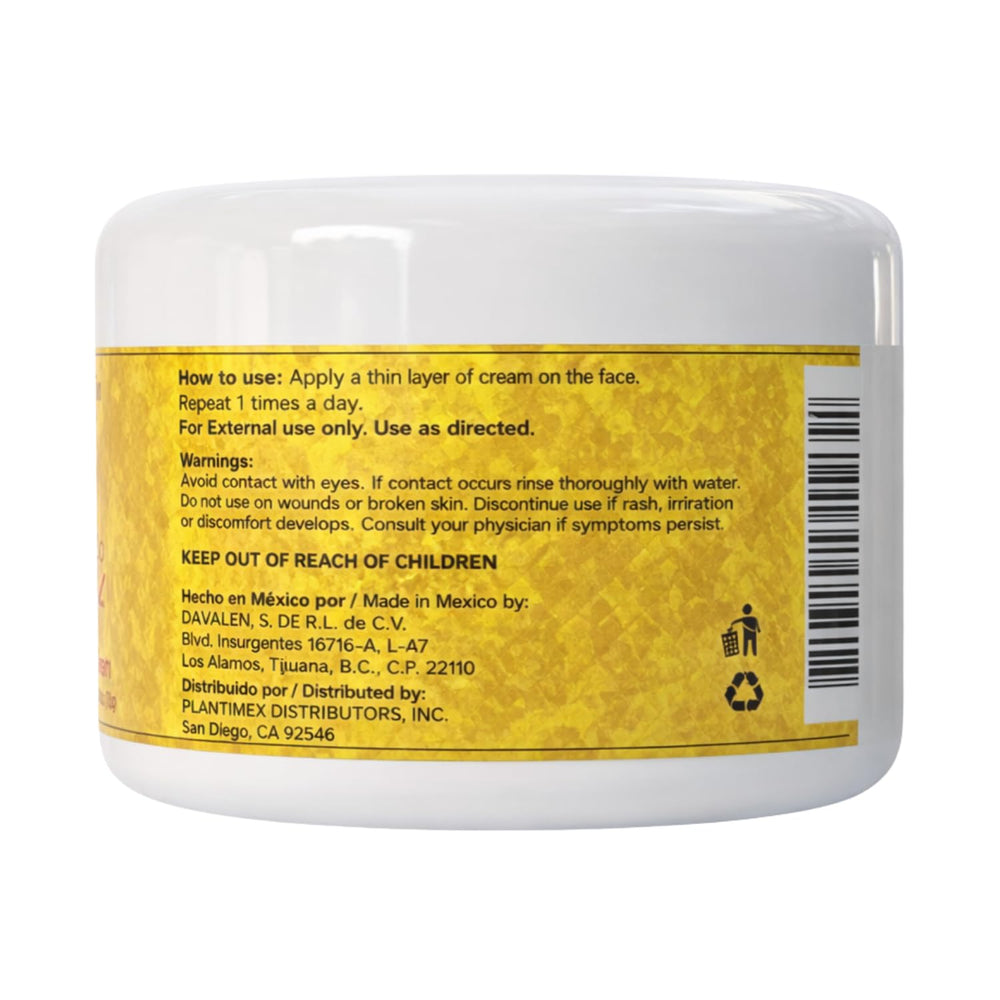Cream texture swirl on skin reveals moisturized, smooth complexion.