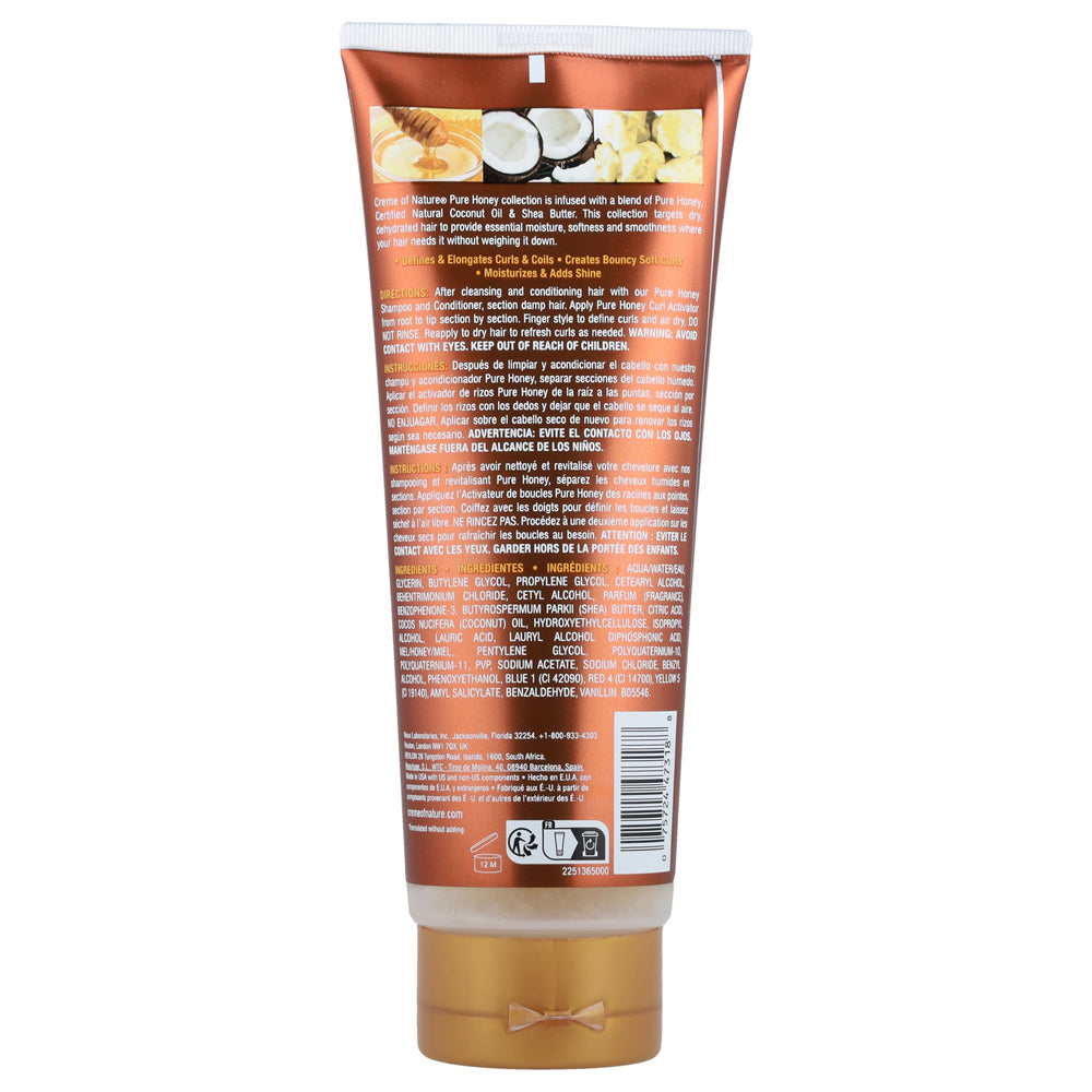 Creme of Nature Pure Honey Curl Activator tube shows elongated curls with added shine