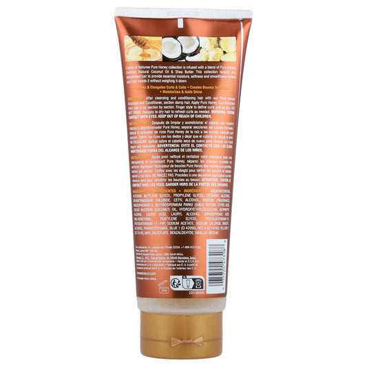 Creme of Nature Pure Honey Curl Activator tube shows elongated curls with added shine
