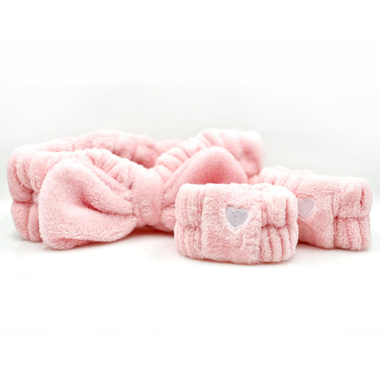 The Crème Shop Spa Teddy Cuff Set absorbs moisture to protect clothing during skincare.