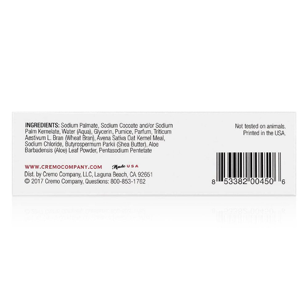 Cremo Bourbon and Oak exfoliating bar fragrance swirls under shower