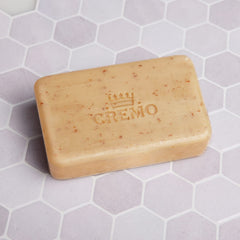 Cremo Bourbon and Oak exfoliating bar ready for post-workout refresh