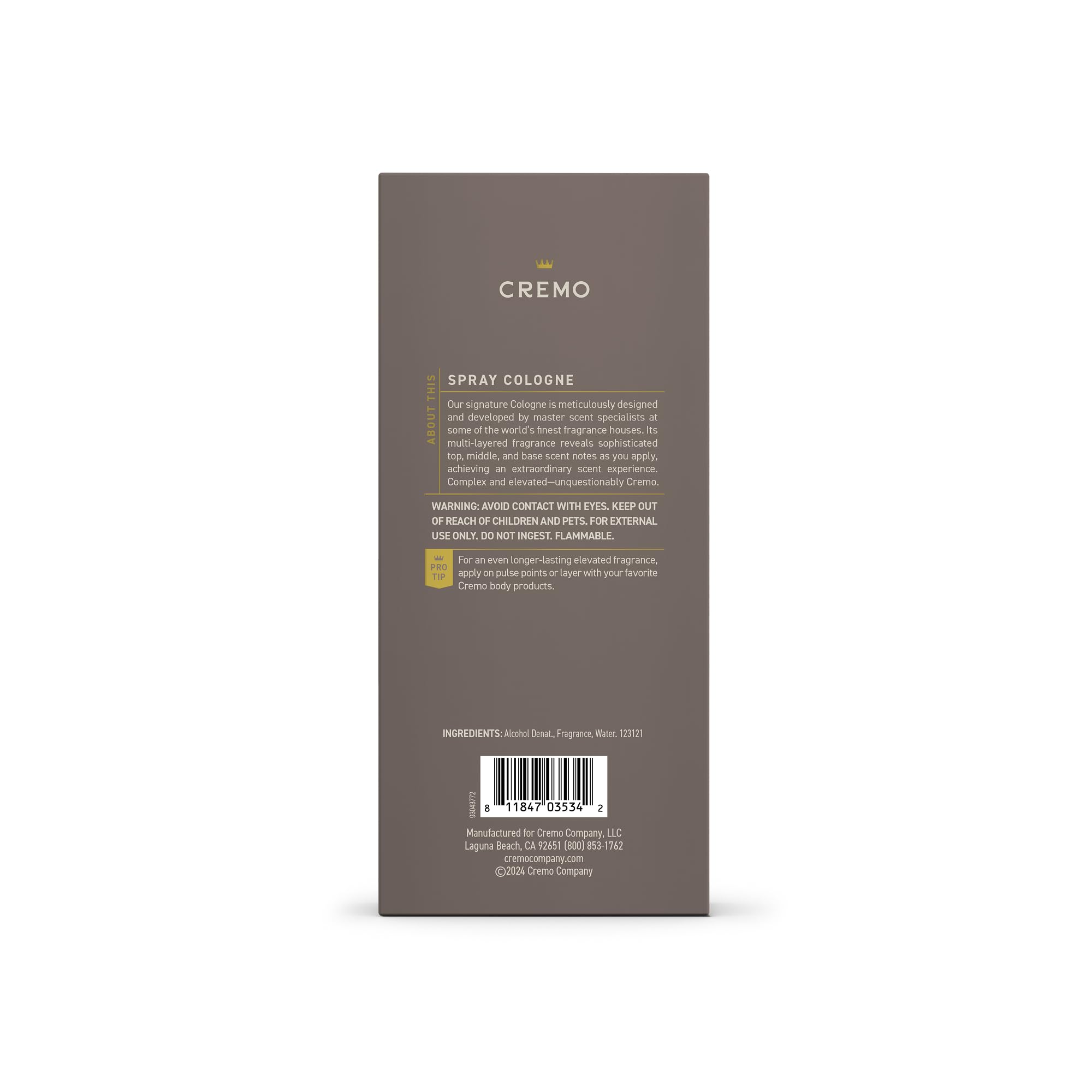 Cremo Vintage Suede bottle with amber backdrop, showcases rich suede notes.