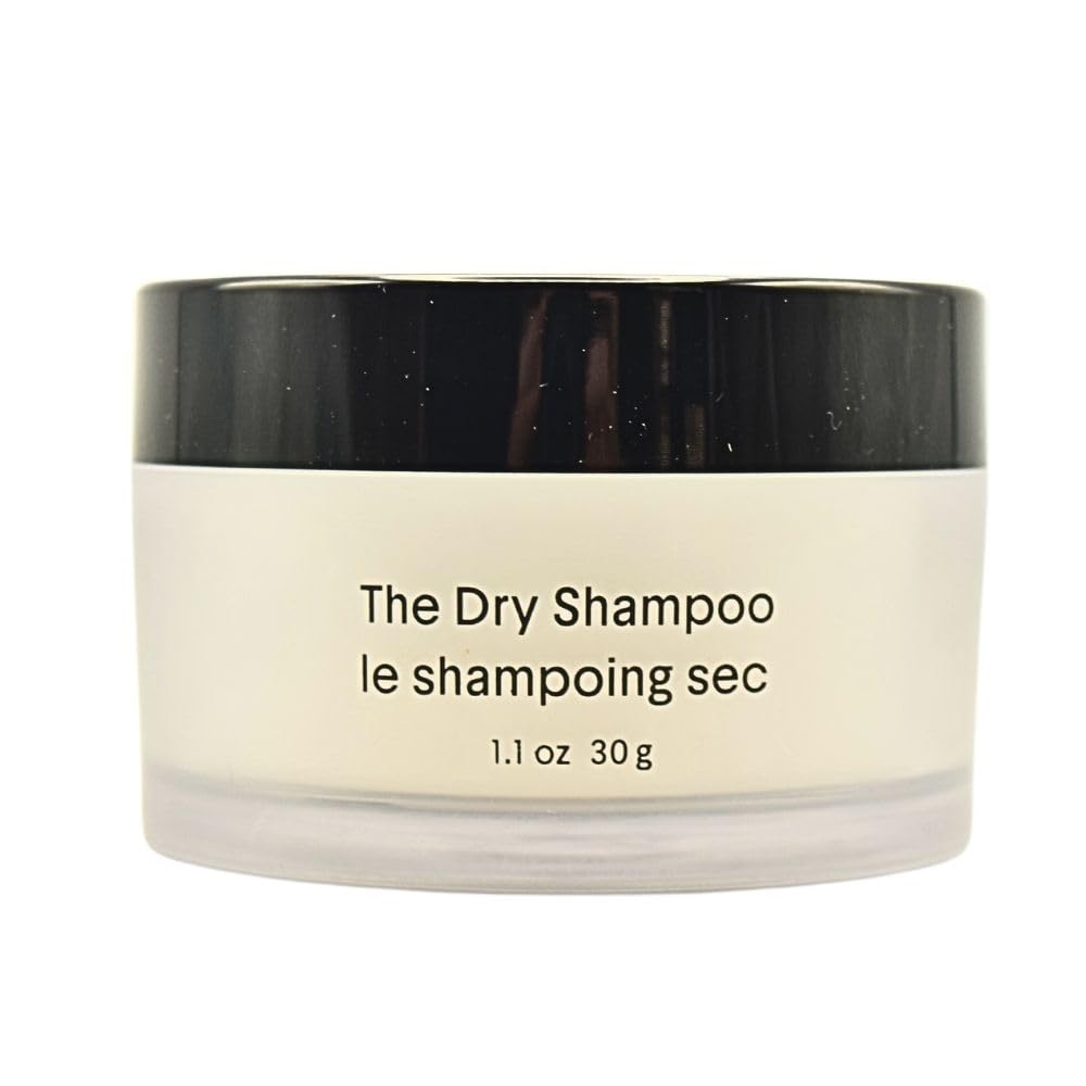 Crown Affair dry shampoo bottle with kabuki brush for precise root refresh.