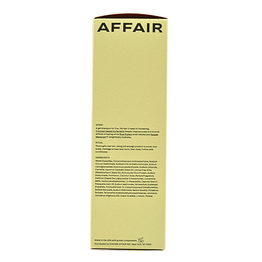 Crown Affair Volumizing Shampoo being poured to reveal creamy lather.