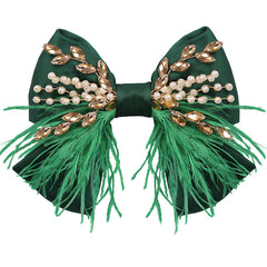 Crown Guide large green satin bow clip adds bold elegance to any hairstyle.
