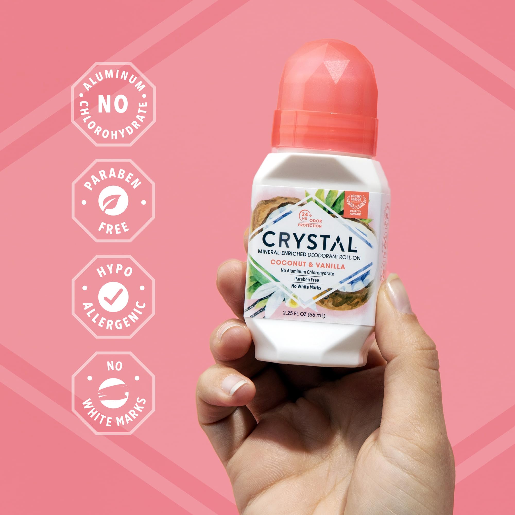 Crystal Essence Coconut Vanilla roll-on being applied to underarm.