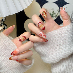 CTTHNBD almond press on nails with gold flower detail adds luxe charm